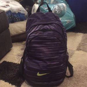 Purple and neon Nike backpack